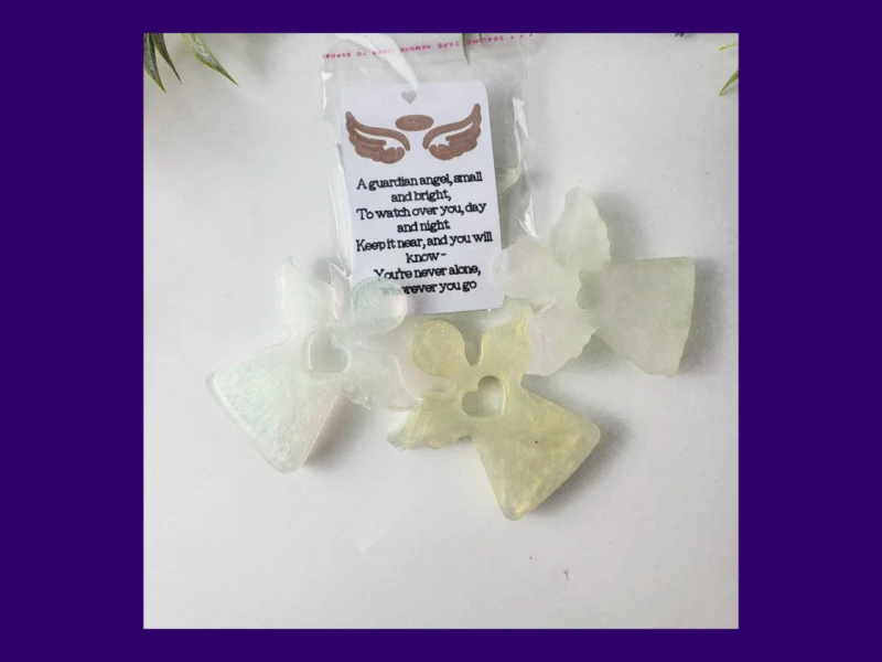 Resin Guardian Angels packaged with a printed verse card featuring an angel poem.