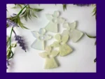 Handmade resin Guardian Angels displayed in a group with lavender and greenery.