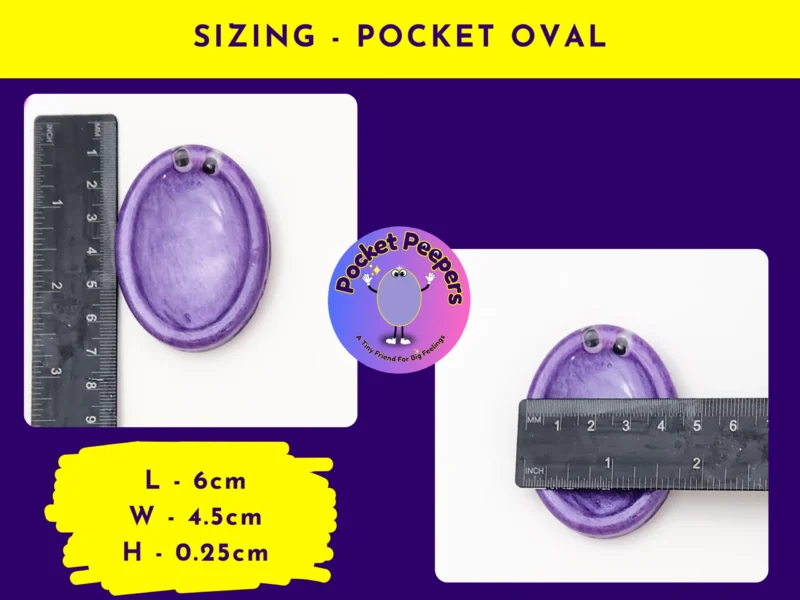 Pocket Peepers oval-shaped fidget pebble photographed beside a ruler to display accurate length and width.