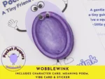 Close-up of the Wobblewink Pocket Peepers stone attached to its character card, with the full set contents listed beneath