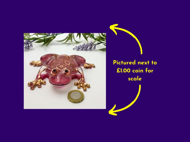Steampunk resin frog next to £1 coin for size reference.