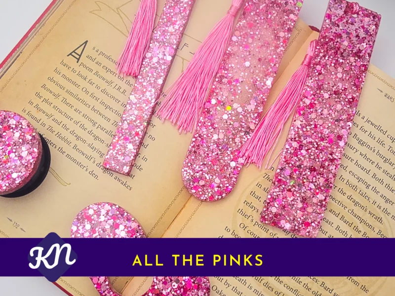 “All the Pinks” hero image showing the full pink glitter set on an open book with banner text.